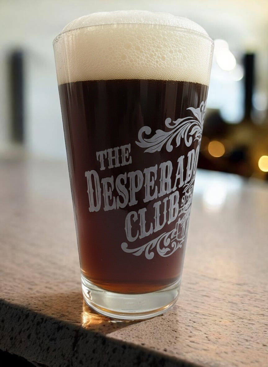 Desperado Club Pint Glass – Dungeon Crawler Carl inspired artwork